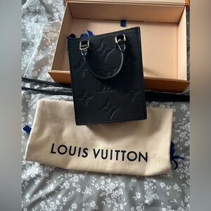 LOUIS VUITTON
Empreinte Monogram  Petit Sac Plat Black